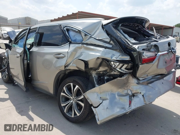 2019 Lexus RX 350L Premium with VIN JTJGZKCA5K2012847, listed as a IAAI auction lot 42331497 with 100,945 mi miles and . Bid and sale history available at DreamBid. Image 3.