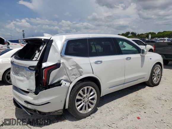 2020 Cadillac XT6 FWD Premium Luxury z VIN 1GYKPCRS7LZ235645, wystawiony jako Copart lot #58977995 z przebiegiem 42 504 mil mil oraz Nie do naprawy • Non repairable. Historia ofert i sprzedaży dostępna na DreamBid. Obrazek 3.