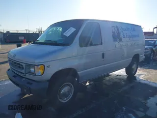 2001 Ford Econoline Cargo Commercial with VIN 1FTNE24L91HA47845, listed as a IAAI auction lot 40928145 with 227,427 mi miles and . Bid and sale history available at carsss.com. Image 16.