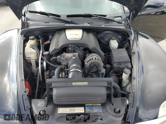 2003 Chevrolet SSR LS z VIN 1GCES14P73B101557, wystawiony jako Copart lot #73679984 z przebiegiem 107 554 mil mil oraz Szkoda całkowita • Salvage title. Historia ofert i sprzedaży dostępna na DreamBid. Obrazek 11.