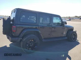 2023 Jeep Wrangler Sahara z VIN 1C4JJXP66PW605961, wystawiony jako Copart lot #50209655 z przebiegiem 32 805 mil mil oraz Szkoda całkowita • Salvage title. Historia ofert i sprzedaży dostępna na DreamBid. Obrazek 3.