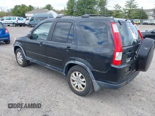 2005 Honda CR-V EX SE with VIN JHLRD789X5C004752, listed as a IAAI auction lot 42057724 with 243,631 mi miles. Bid and sale history available at carsss.com. Image 3.