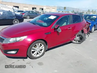 2012 Kia Optima LX z VIN 5XXGM4A78CG056373, wystawiony jako IAAI lot #42263150 z przebiegiem 81 905 mil mil oraz . Historia ofert i sprzedaży dostępna na DreamBid. Obrazek 6.