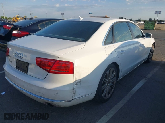 2013 Audi A8 3.0L z VIN WAURGAFD5DN009804, wystawiony jako IAAI lot #42642523 z przebiegiem 141 252 mil mil oraz . Historia ofert i sprzedaży dostępna na DreamBid. Obrazek 6.