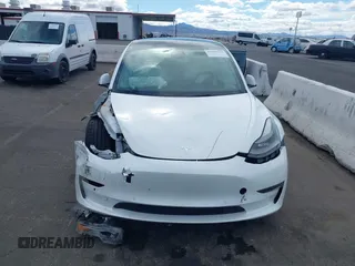 2022 Tesla Model 3 Performance with VIN 5YJ3E1EC6NF111958, listed as a IAAI auction lot 41583972 with 28,431 mi miles and . Bid and sale history available at DreamBid. Image 6.
