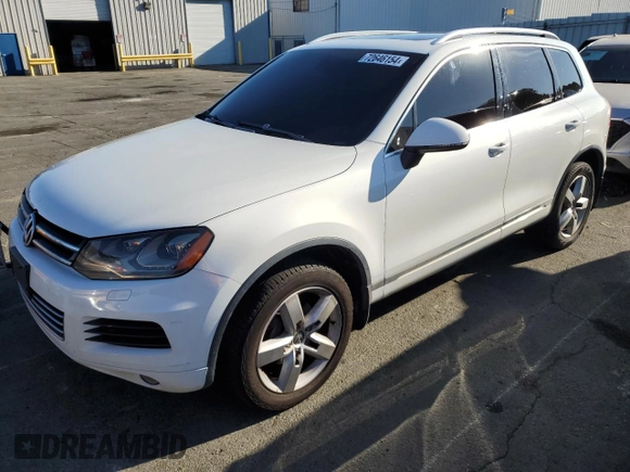 2012 Volkswagen Touareg Exec with VIN WVGEF9BP1CD010015, listed as a Copart auction lot 72646154 with 163,502 mi miles and Salvage Title. Bid and sale history available at DreamBid. Image 1.