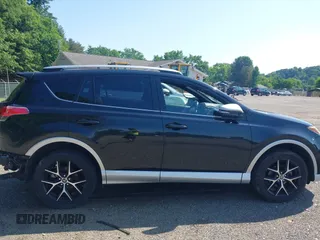 2016 Toyota RAV4 SE with VIN JTMJFREV2GJ089599, listed as a IAAI auction lot 42551300 with 90,352 mi miles and . Bid and sale history available at DreamBid. Image 14.