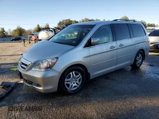 2006 Honda Odyssey EX-L z VIN 5FNRL38706B439081, wystawiony jako Copart lot #86719184 z przebiegiem 74 615 mil mil oraz Szkoda całkowita • Salvage title. Historia ofert i sprzedaży dostępna na DreamBid. Obrazek 1.