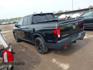 2023 Honda Ridgeline Black Edition with VIN 5FPYK3F83PB023481, listed as a IAAI auction lot 42157928 with 24,632 mi miles and . Bid and sale history available at DreamBid. Image 3.