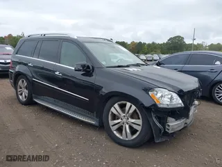 2011 Mercedes-Benz GL-Class GL 450 with VIN 4JGBF7BE6BA635581, listed as a IAAI auction lot 40401205 with 112,344 mi miles. Bid and sale history available at carsss.com. Image 1.