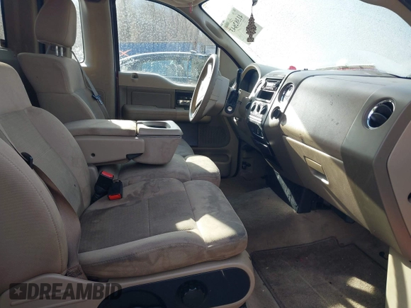 2005 Ford F-150 XL with VIN 1FTRF14W05NA77908, listed as a IAAI auction lot 41382643 with 128,135 mi miles. Bid and sale history available at carsss.com. Image 5.