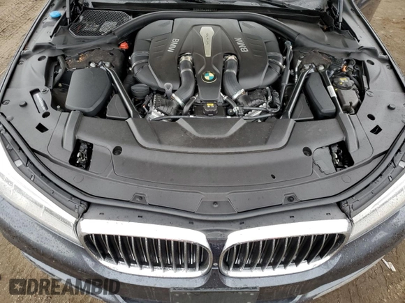 2016 BMW 7 Series 750i with VIN WBA7F0C54GGL99661, listed as a Copart auction lot 71742154 with 104,498 mi miles and Salvage Title. Bid and sale history available at carsss.com. Image 11.