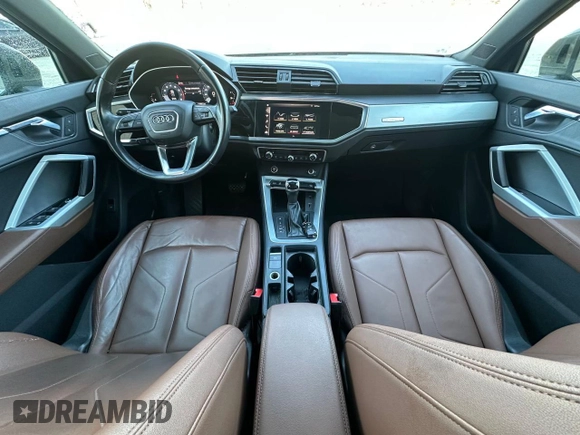 2021 Audi Q3 Premium z VIN WA1AUCF3XM1102363, wystawiony jako Copart lot #58672195 z przebiegiem 208 956 mil mil oraz Czysty tytuł • Clean title. Historia ofert i sprzedaży dostępna na DreamBid. Obrazek 9.