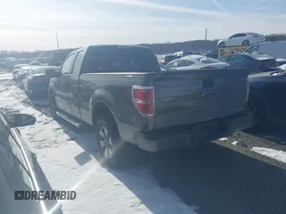 2013 Ford F-150 XL with VIN 1FTFX1CF8DKD57142, listed as a IAAI auction lot 41213305 with 157,031 mi miles. Bid and sale history available at carsss.com. Image 3.