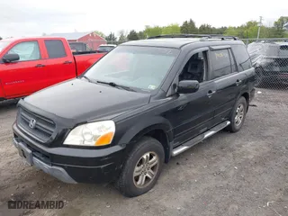 2005 Honda Pilot EX-L with NAVI with VIN 2HKYF187X5H572423, listed as a IAAI auction lot 42088750 with 203,265 mi miles. Bid and sale history available at carsss.com. Image 2.