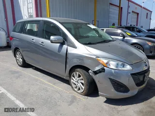 2015 Mazda Mazda5 Sport with VIN JM1CW2BL8F0185437, listed as a IAAI auction lot 41932380 with 90,029 mi miles. Bid and sale history available at carsss.com. Image 1.