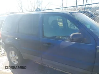 2003 Ford Escape XLT Popular with VIN 1FMYU03103KD07779, listed as a IAAI auction lot 42019919 with 245,522 mi miles. Bid and sale history available at carsss.com. Image 13.