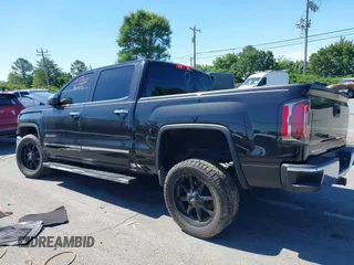 2017 GMC Sierra 1500 SLT with VIN 3GTP1NEC2HG202079, listed as a IAAI auction lot 42322915 with 130,412 mi miles and . Bid and sale history available at DreamBid. Image 14.
