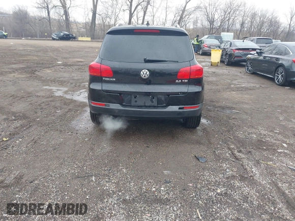 2012 Volkswagen Tiguan SE with VIN WVGAV7AX0CW602713, listed as a IAAI auction lot 41558520 with 95,678 mi miles and . Bid and sale history available at DreamBid. Image 16.