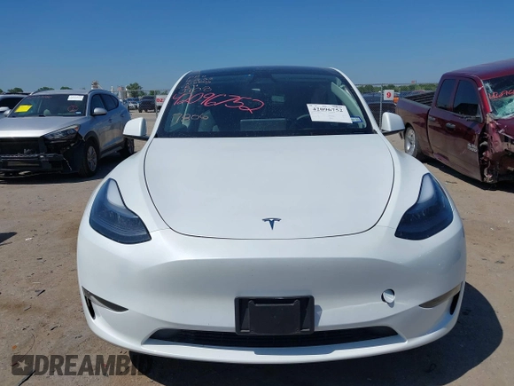 2024 Tesla Model Y with VIN 7SAYGDED0RA327806, listed as a IAAI auction lot 42096752 with 13,244 mi miles and . Bid and sale history available at DreamBid. Image 12.