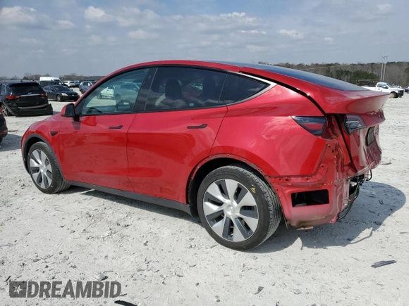 2021 Tesla Model Y Standard Range with VIN 5YJYGDED3MF107259, listed as a Copart auction lot 48566935 with 68,561 mi miles and Salvage Title. Bid and sale history available at carsss.com. Image 2.