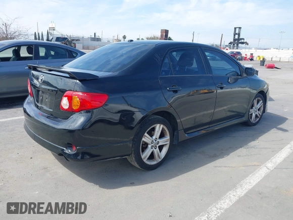 2009 Toyota Corolla XRS with VIN 1NXBE40EX9Z100623, listed as a IAAI auction lot 42032138 with 183,901 mi miles. Bid and sale history available at carsss.com. Image 4.