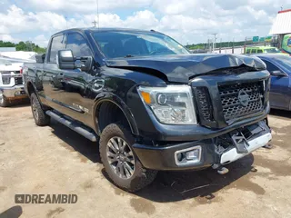 2017 Nissan Titan Platinum Reserve z VIN 1N6AA1F43HN500781, wystawiony jako IAAI lot #42220311 z przebiegiem 133 612 mil mil oraz . Historia ofert i sprzedaży dostępna na DreamBid. Obrazek 1.