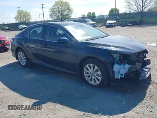 2019 Toyota Camry LE with VIN 4T1B11HK3KU254083, listed as a IAAI auction lot 42091530 with 26,635 mi miles and . Bid and sale history available at DreamBid. Image 1.