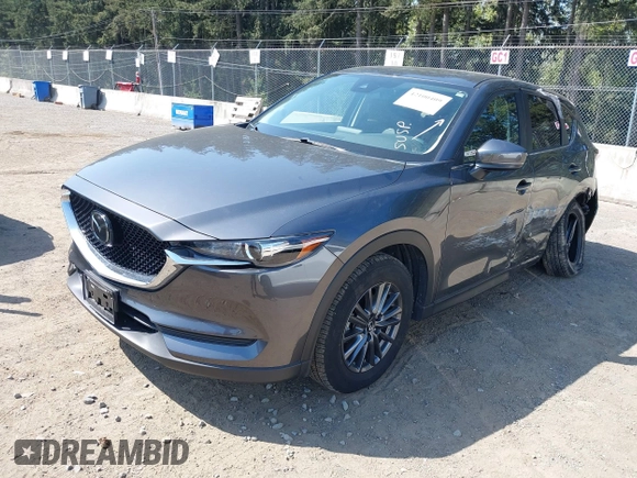 2020 Mazda CX-5 Touring with VIN JM3KFBCM6L1828691, listed as a IAAI auction lot 42100409 with 25,182 mi miles. Bid and sale history available at carsss.com. Image 22.