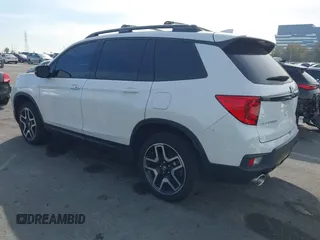 2023 Honda Passport Elite with VIN 5FNYF8H07PB010220, listed as a IAAI auction lot 41675730 with 25,128 mi miles and . Bid and sale history available at DreamBid. Image 3.