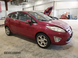 2011 Ford Fiesta SES with VIN 3FADP4FJ7BM176005, listed as a Copart auction lot 50411095 with 124,007 mi miles and Non Repairable. Bid and sale history available at carsss.com. Image 4.