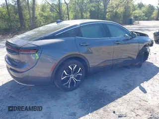 2023 Toyota Crown XLE с VIN JTDAAAAF7P3010236, выставлен на аукционе IAAI как лот 42008655 с пробегом 28 073 миль миль и . История ставок и продаж доступна на DreamBid. Изображение 4.