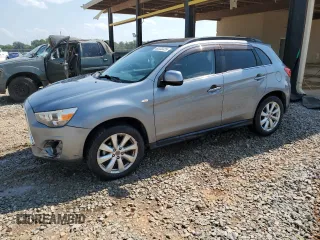 2014 Mitsubishi Outlander SE z VIN 4A4AP4AU5EE001219, wystawiony jako Copart lot #60333325 z przebiegiem 105 016 mil mil oraz Szkoda całkowita • Salvage title. Historia ofert i sprzedaży dostępna na DreamBid. Obrazek 1.