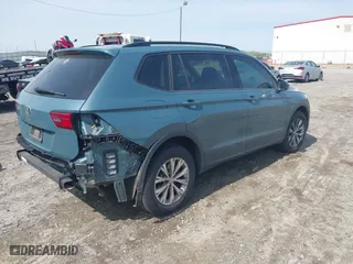 2019 Volkswagen Tiguan S with VIN 3VV1B7AX2KM131063, listed as a IAAI auction lot 41937501 with 59,402 mi miles. Bid and sale history available at carsss.com. Image 4.