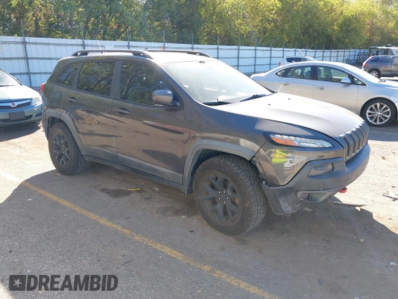 2014 Jeep Cherokee Trailhawk with VIN 1C4PJMBB0EW237741, listed as a IAAI auction lot 40505251 with 139,883 mi miles and . Bid and sale history available at DreamBid. Image 1.