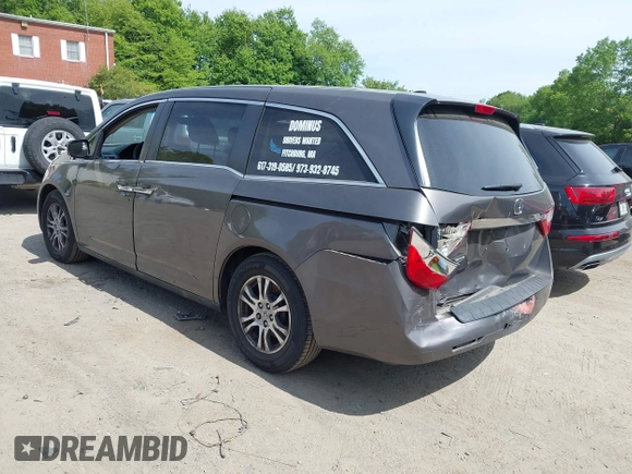 2012 Honda Odyssey EX-L with VIN 5FNRL5H63CB037697, listed as a IAAI auction lot 42262596 with 135,218 mi miles and . Bid and sale history available at DreamBid. Image 3.