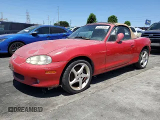 2001 Mazda MX-5 Miata with VIN JM1NB353710216031, listed as a Copart auction lot 63120105 with 123,085 mi miles and Clean title. Bid and sale history available at DreamBid. Image 1.