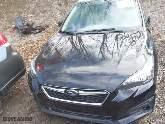 2017 Subaru Impreza Premium with VIN 4S3GTAB69H3704625, listed as a IAAI auction lot 41864611 with 71,352 mi miles. Bid and sale history available at carsss.com. Image 22.
