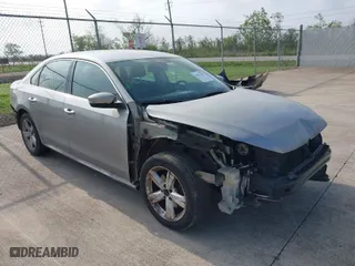 2013 Volkswagen Passat SE with VIN 1VWBP7A38DC086021, listed as a IAAI auction lot 41912361 with 215,843 mi miles. Bid and sale history available at carsss.com. Image 1.