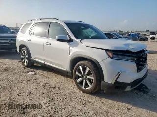 2023 Honda Pilot Elite z VIN 5FNYG1H86PB030033, wystawiony jako Copart lot #61843035 z przebiegiem 48 511 mil mil oraz Szkoda całkowita • Salvage title. Historia ofert i sprzedaży dostępna na DreamBid. Obrazek 4.