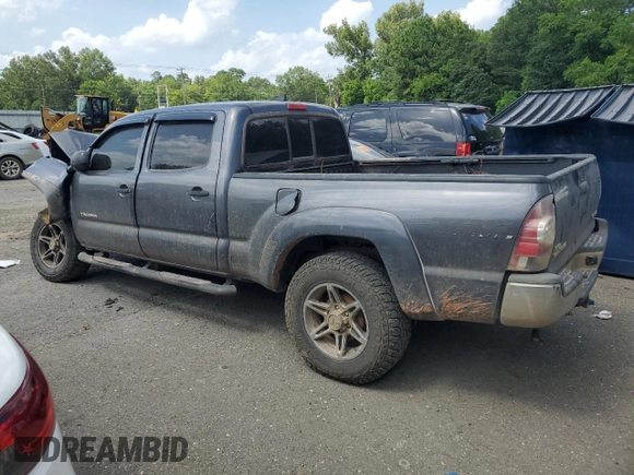 2014 Toyota Tacoma with VIN 5TFMU4FN3EX025697, listed as a Copart auction lot 62146895 with 133,028 mi miles and Salvage title. Bid and sale history available at DreamBid. Image 2.