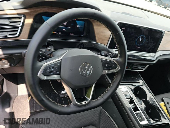 2024 Volkswagen Atlas SE with VIN 1V2HR2CA1RC579096, listed as a IAAI auction lot 42751185 with 15,477 mi miles and . Bid and sale history available at DreamBid. Image 18.