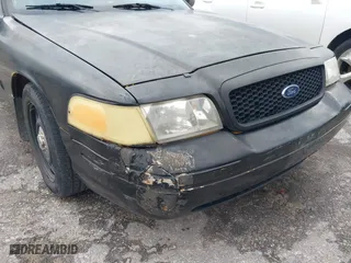 2011 Ford Crown Victoria with VIN 2FABP7AV4BX166216, listed as a IAAI auction lot 41268754 with 205,308 mi miles. Bid and sale history available at carsss.com. Image 6.