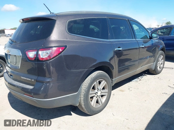 2015 Chevrolet Traverse LT with VIN 1GNKRHKDXFJ274152, listed as a IAAI auction lot 42215591 with 179,866 mi miles and . Bid and sale history available at DreamBid. Image 4.