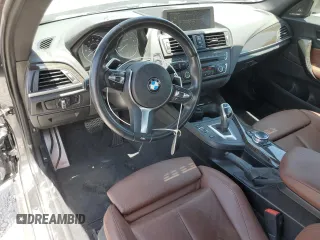 2015 BMW 2 Series M235i with VIN WBA1J7C55FV253647, listed as a Copart auction lot 60231395 with 57,639 mi miles and Salvage title. Bid and sale history available at DreamBid. Image 8.