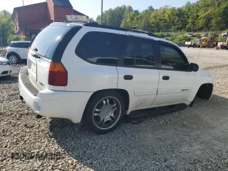 2005 GMC Envoy SLT with VIN 1GKDT13S552329269, listed as a Copart auction lot 69209244 with 154,595 mi miles and Salvage Title. Bid and sale history available at carsss.com. Image 3.