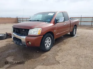 2004 Nissan Titan XE with VIN 1N6AA06A04N508069, listed as a IAAI auction lot 41571931 with 180,119 mi miles. Bid and sale history available at carsss.com. Image 18.