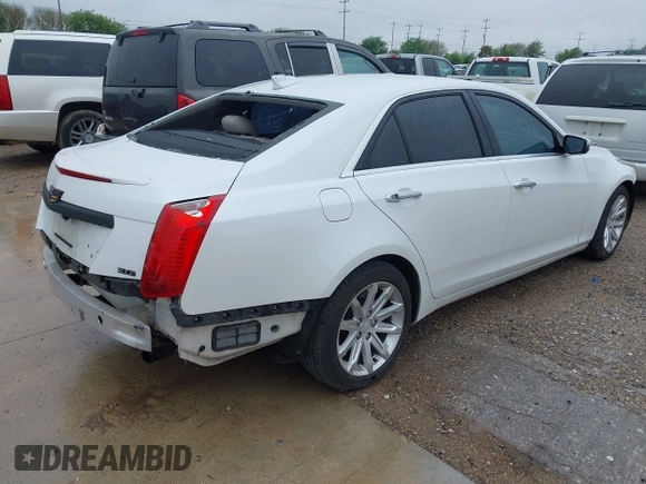 2015 Cadillac CTS Luxury RWD z VIN 1G6AR5S32F0123986, wystawiony jako IAAI lot #41853734 z przebiegiem 108 043 mil mil oraz . Historia ofert i sprzedaży dostępna na DreamBid. Obrazek 4.