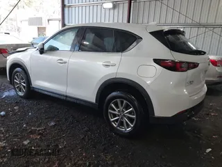 2023 Mazda CX-5 2.5 S Carbon Edition with VIN JM3KFBCM7P0192553, listed as a IAAI auction lot 41893002 with 54,121 mi miles. Bid and sale history available at carsss.com. Image 3.