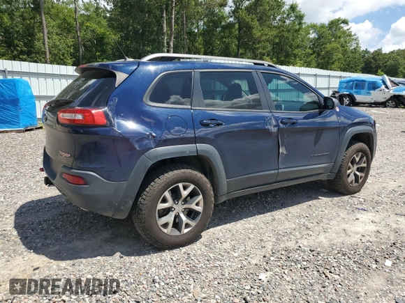 2014 Jeep Cherokee Trailhawk with VIN 1C4PJMBS7EW170345, listed as a Copart auction lot 60565765 with 98,382 mi miles and Salvage title. Bid and sale history available at DreamBid. Image 3.